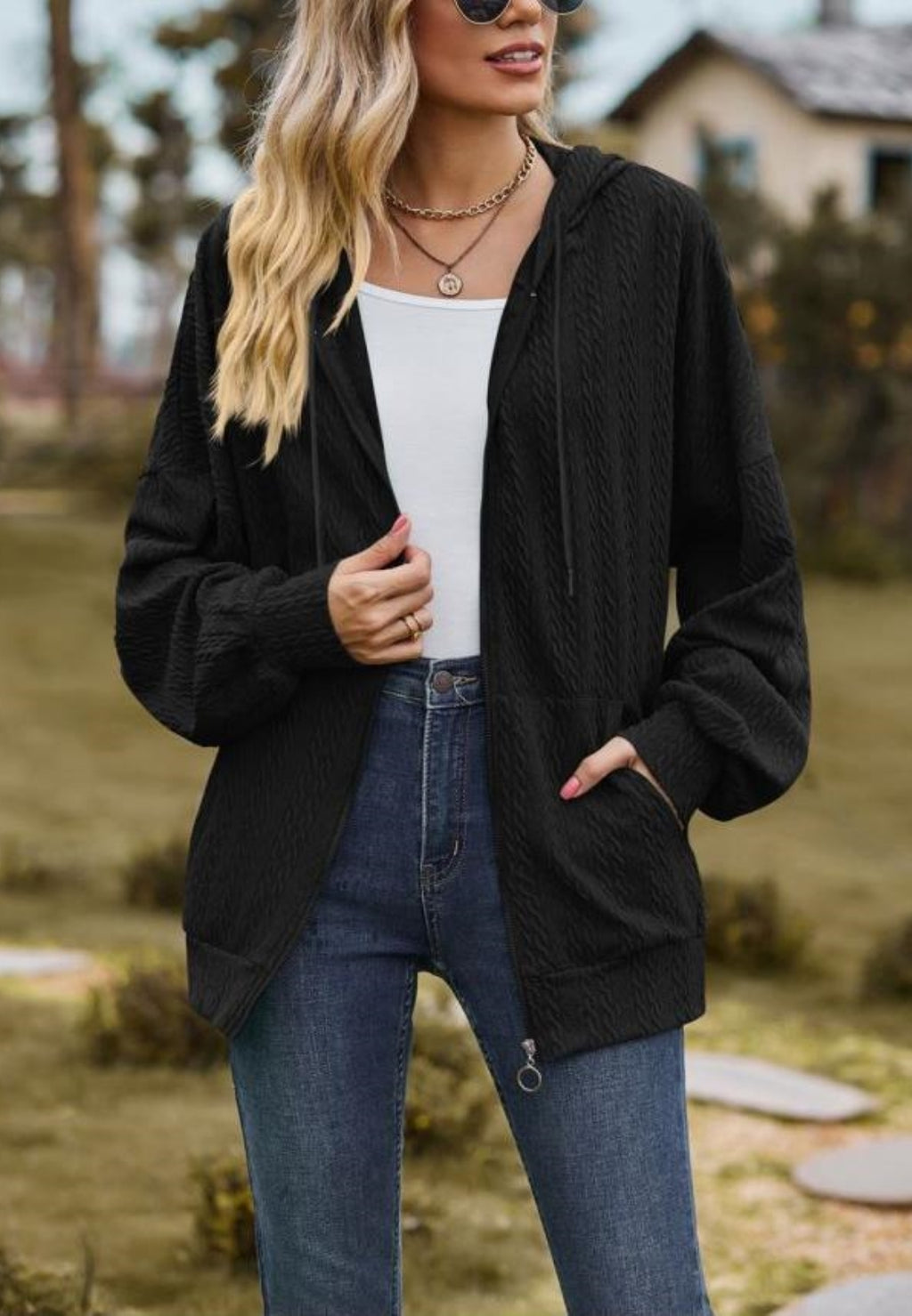 Chaqueta de punto trenzado con cremallera