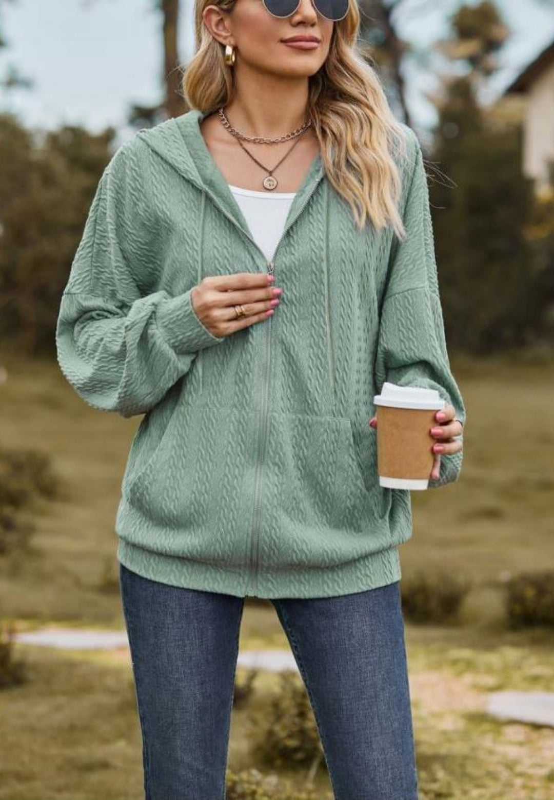 Chaqueta de punto trenzado con cremallera