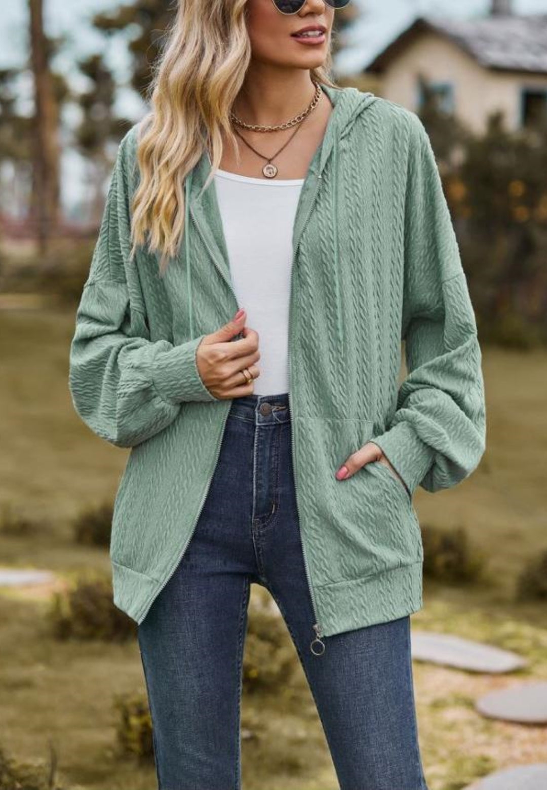 Chaqueta de punto trenzado con cremallera