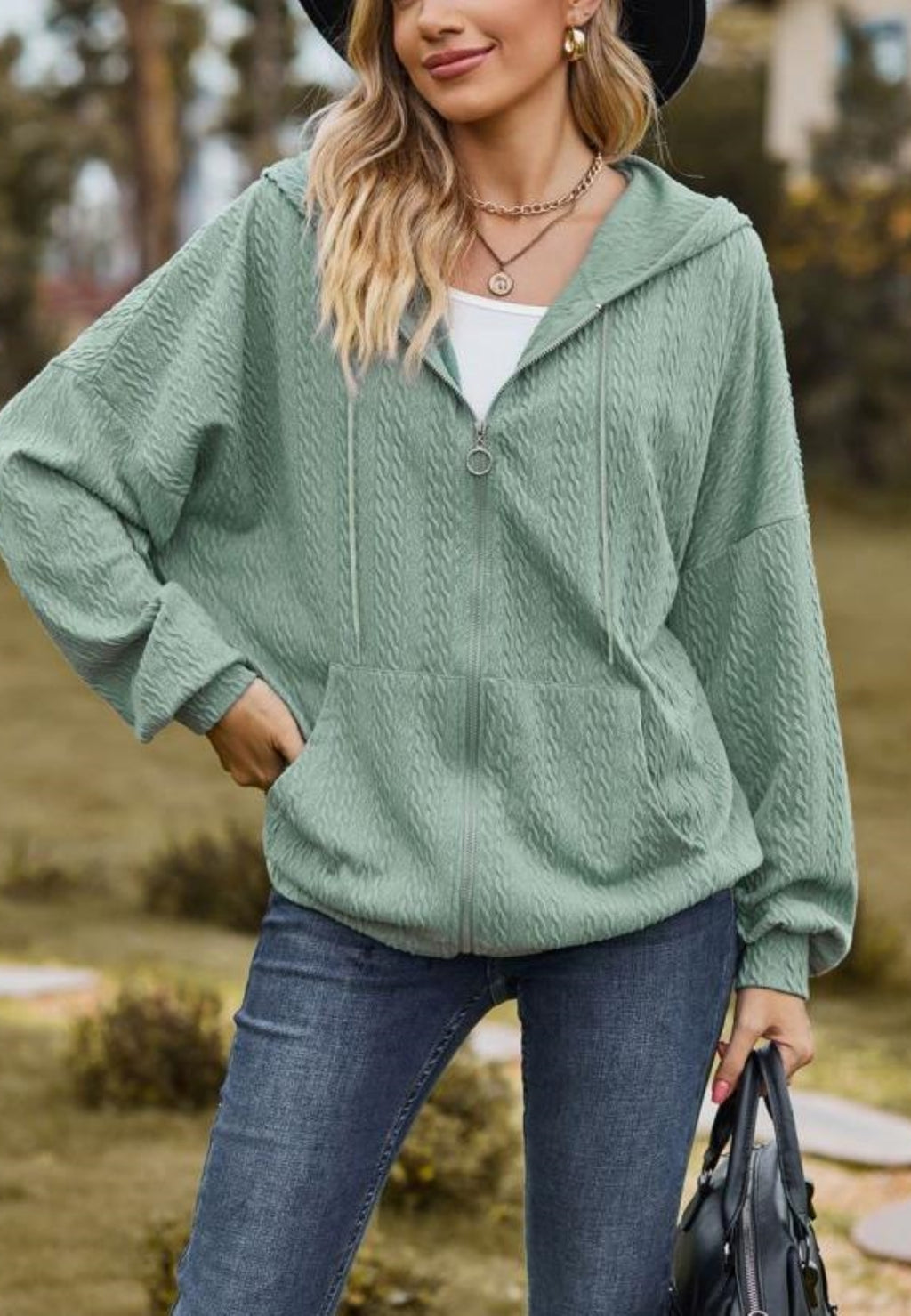Chaqueta de punto trenzado con cremallera