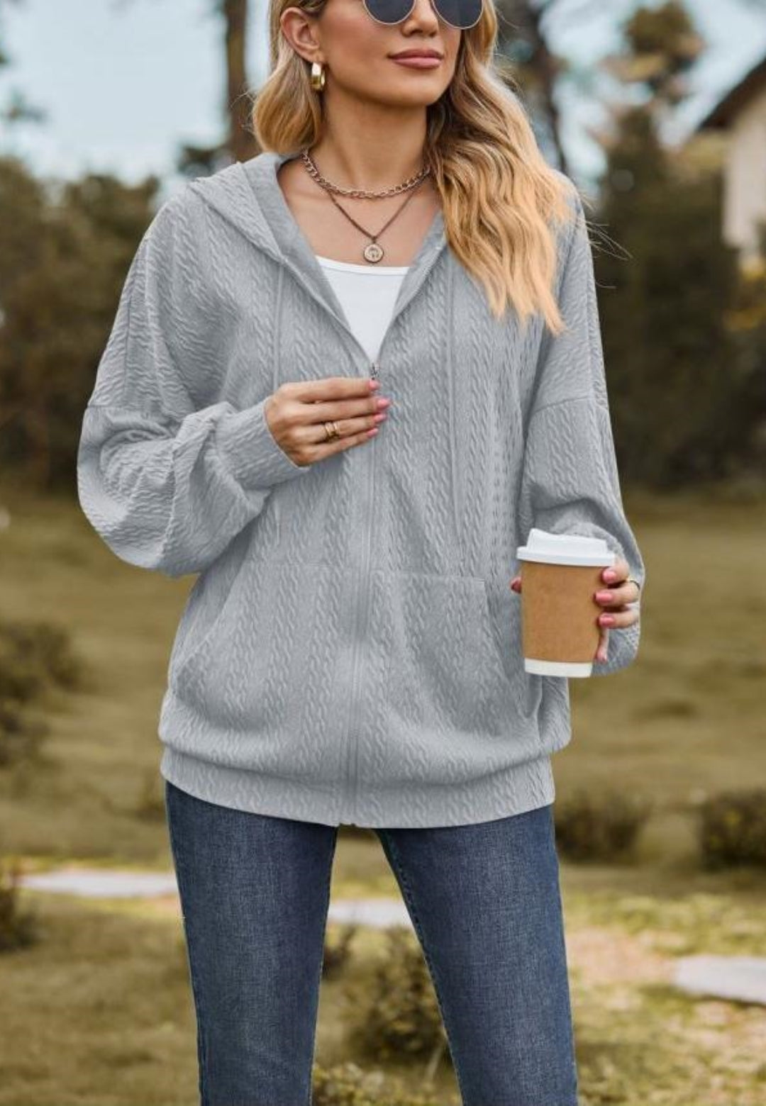 Chaqueta de punto trenzado con cremallera
