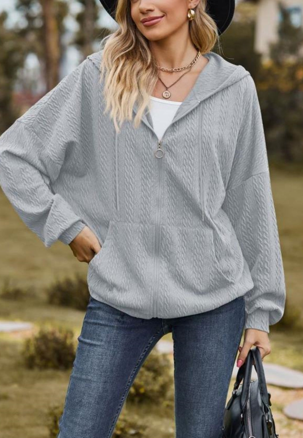 Chaqueta de punto trenzado con cremallera