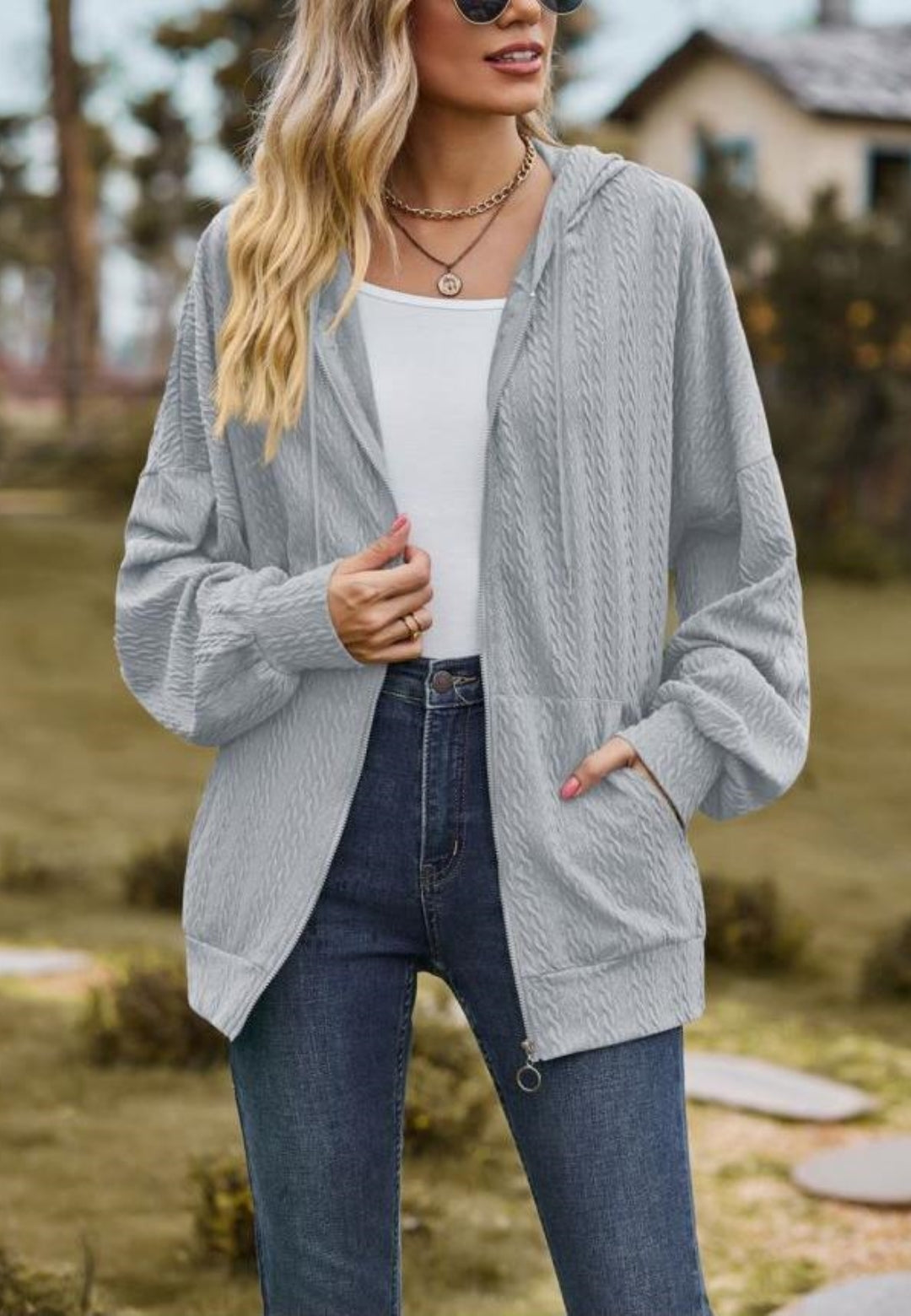 Chaqueta de punto trenzado con cremallera