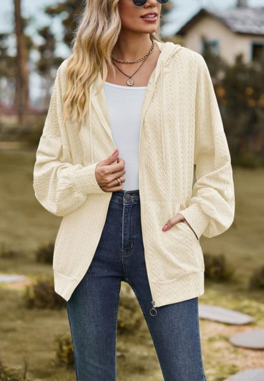 Chaqueta de punto trenzado con cremallera