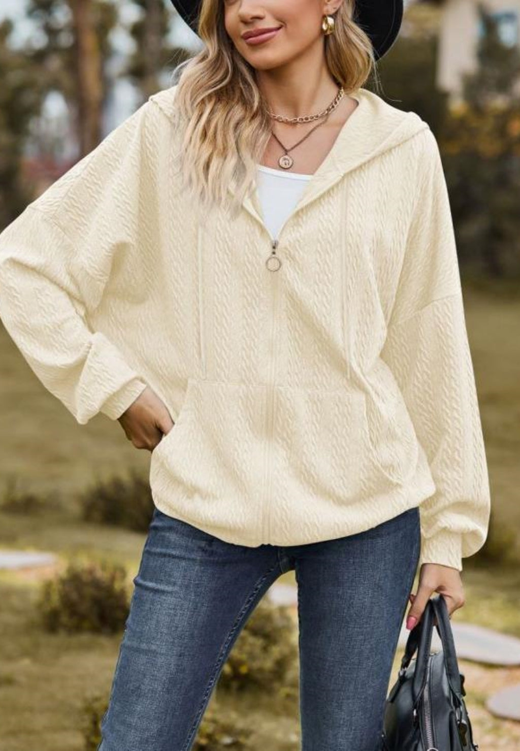 Chaqueta de punto trenzado con cremallera