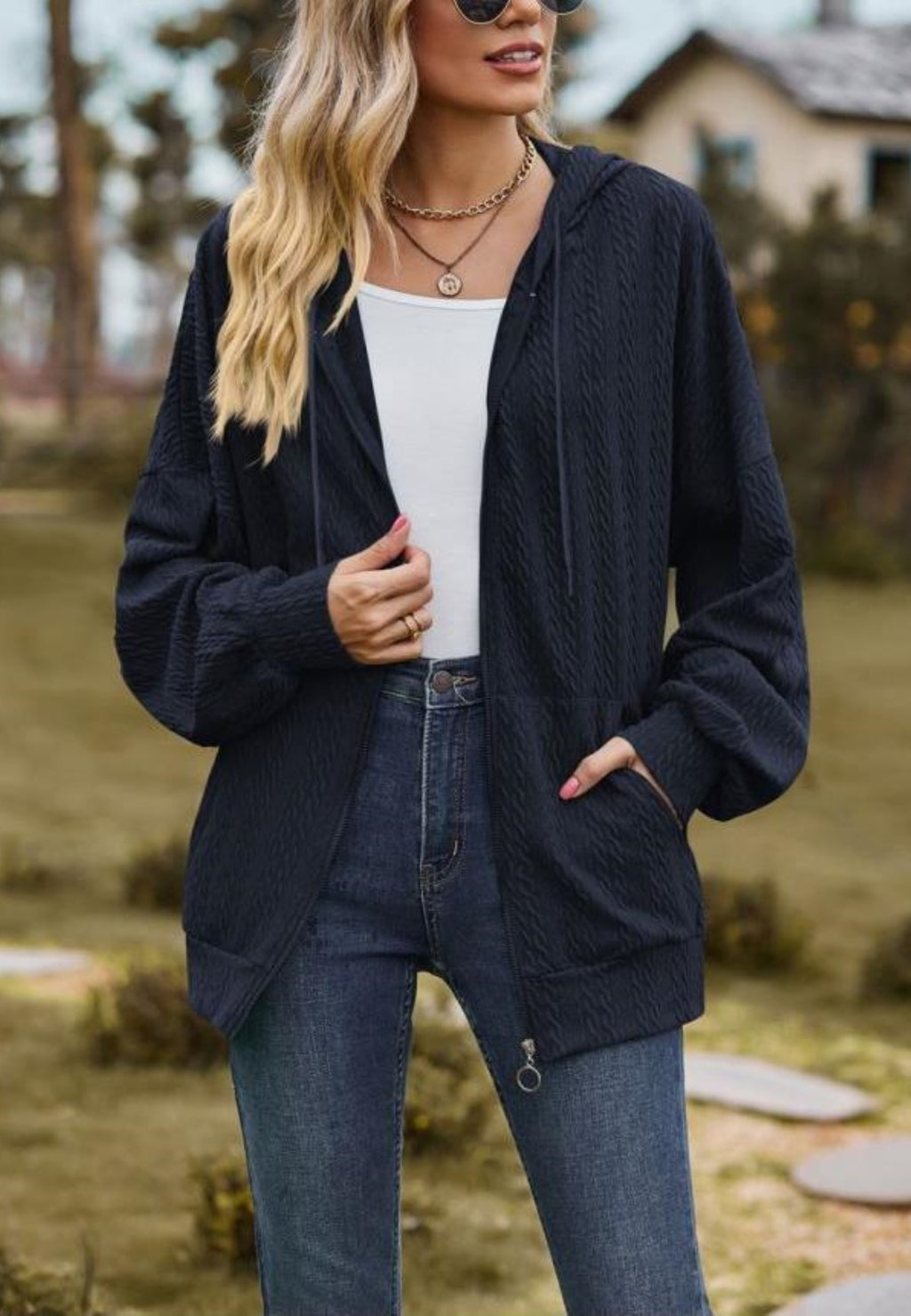 Chaqueta de punto trenzado con cremallera