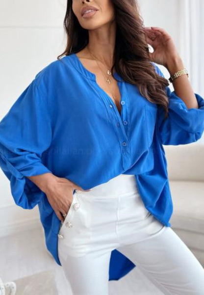 Camisa con botones y solapa enrollable