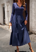Vestido plisado con escote cruzado y capas