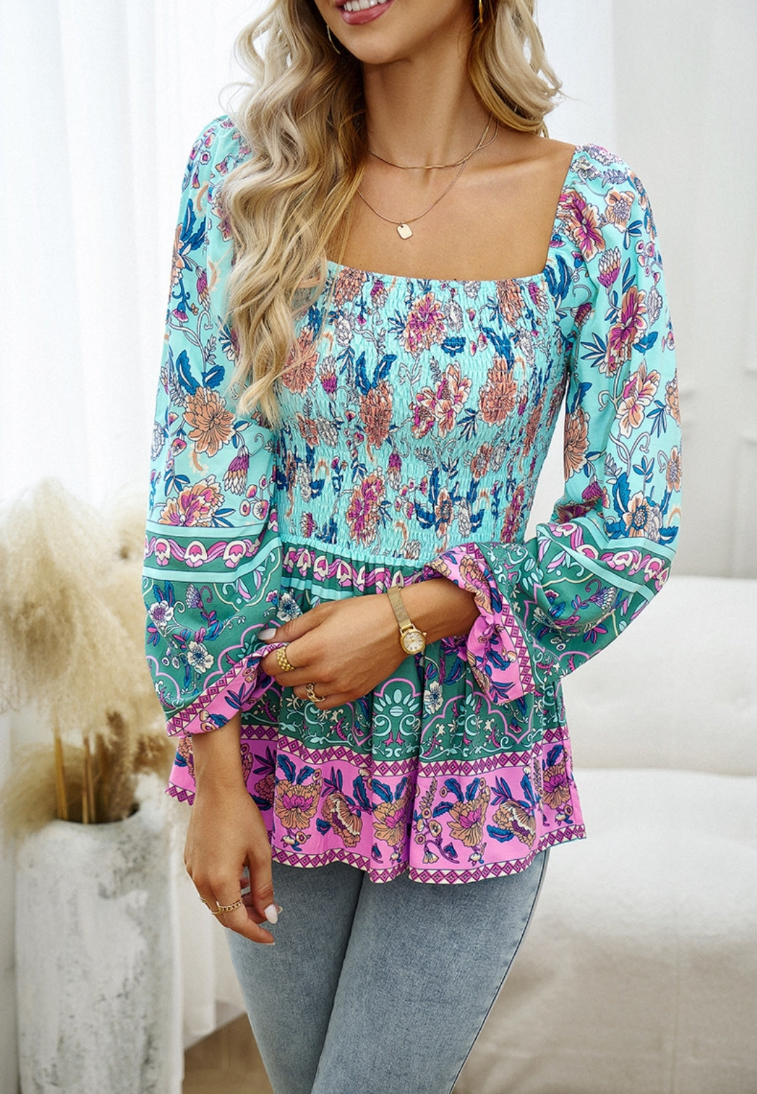 Blusa con hombros descubiertos y estampado floral multicolor