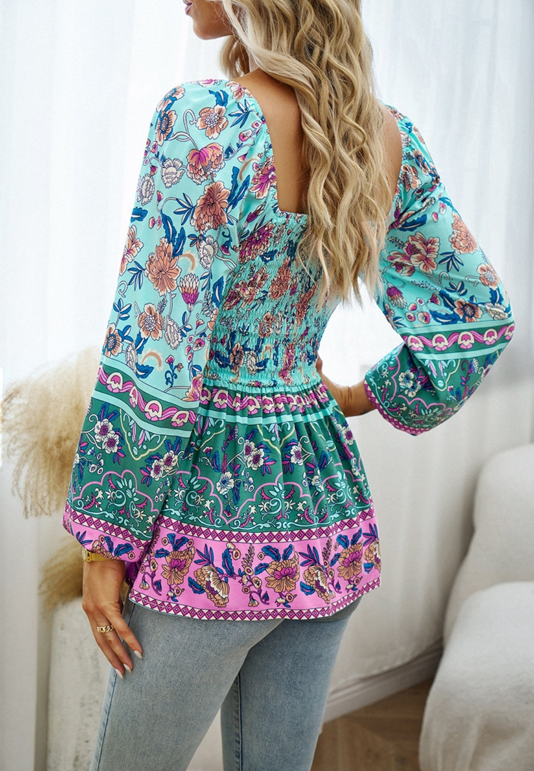 Blusa con hombros descubiertos y estampado floral multicolor