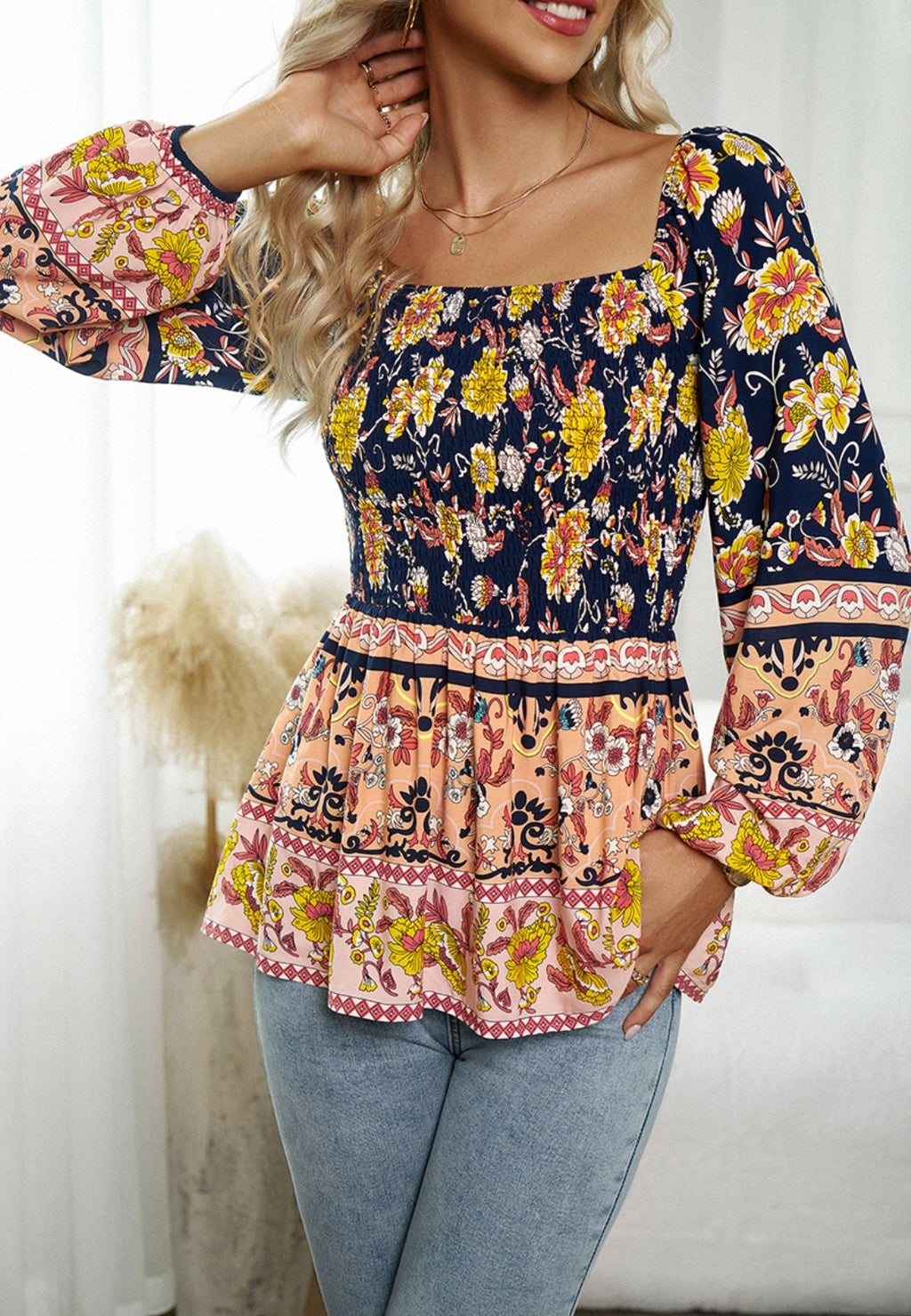 Blusa con hombros descubiertos y estampado floral multicolor