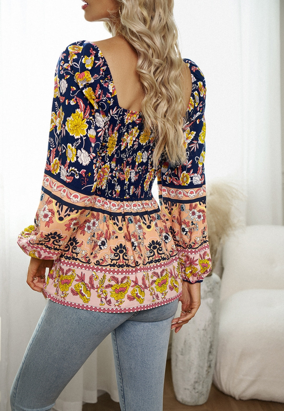 Blusa con hombros descubiertos y estampado floral multicolor