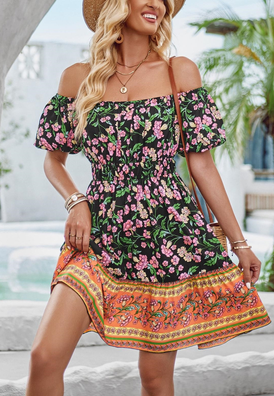 Vestido bohemio con estampado floral y hombros descubiertos