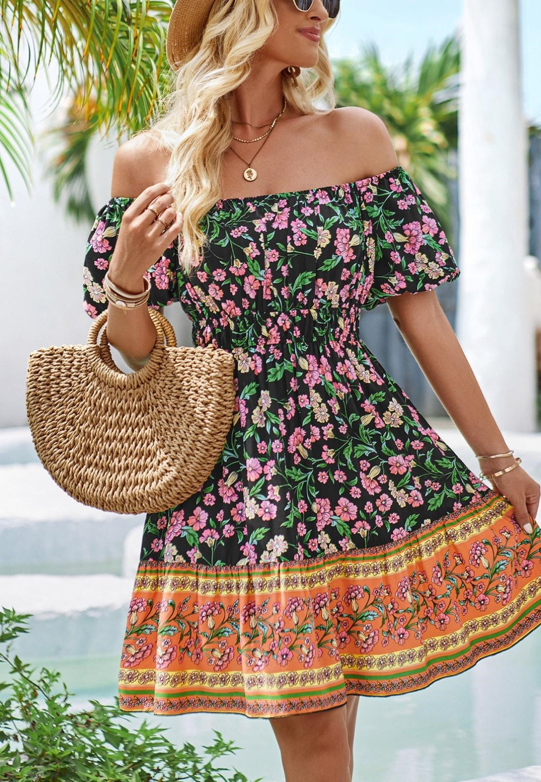 Vestido bohemio con estampado floral y hombros descubiertos
