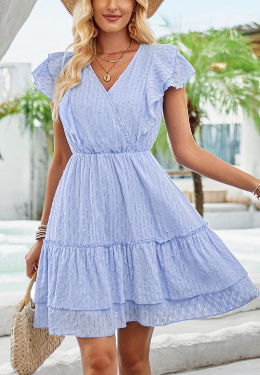 Vestido con detalle de ojales y mangas con volantes