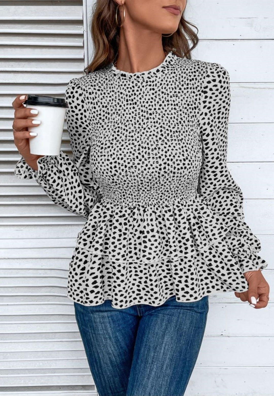 Blusa peplum con capas y estampado de guepardo