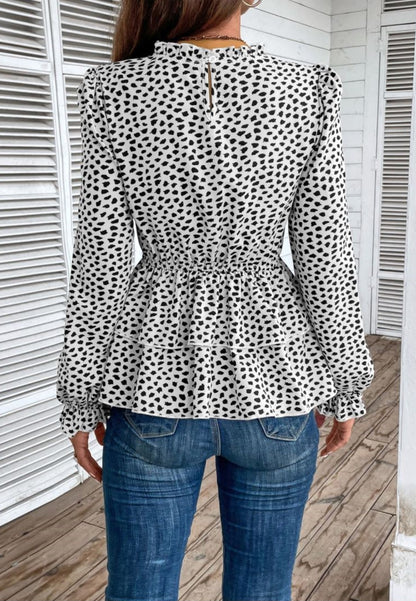 Blusa peplum con capas y estampado de guepardo