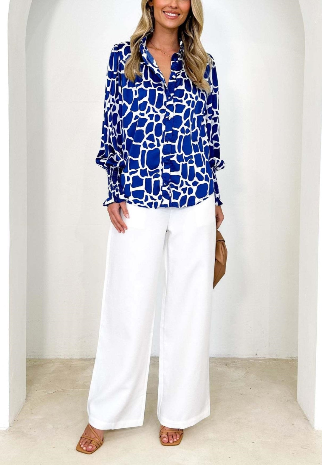 Camisa polo estampada con puños fruncidos