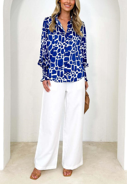 Camisa polo estampada con puños fruncidos