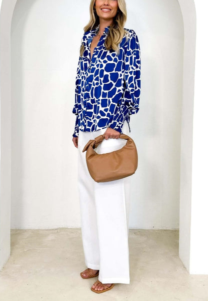 Camisa polo estampada con puños fruncidos