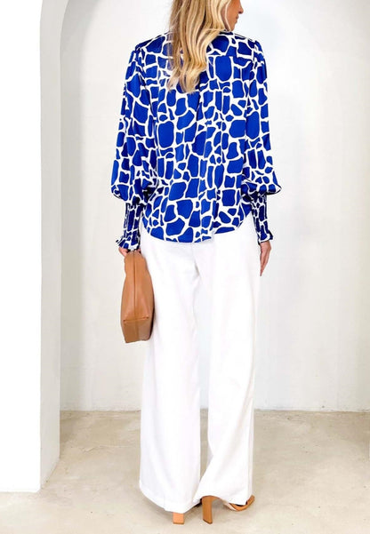 Camisa polo estampada con puños fruncidos