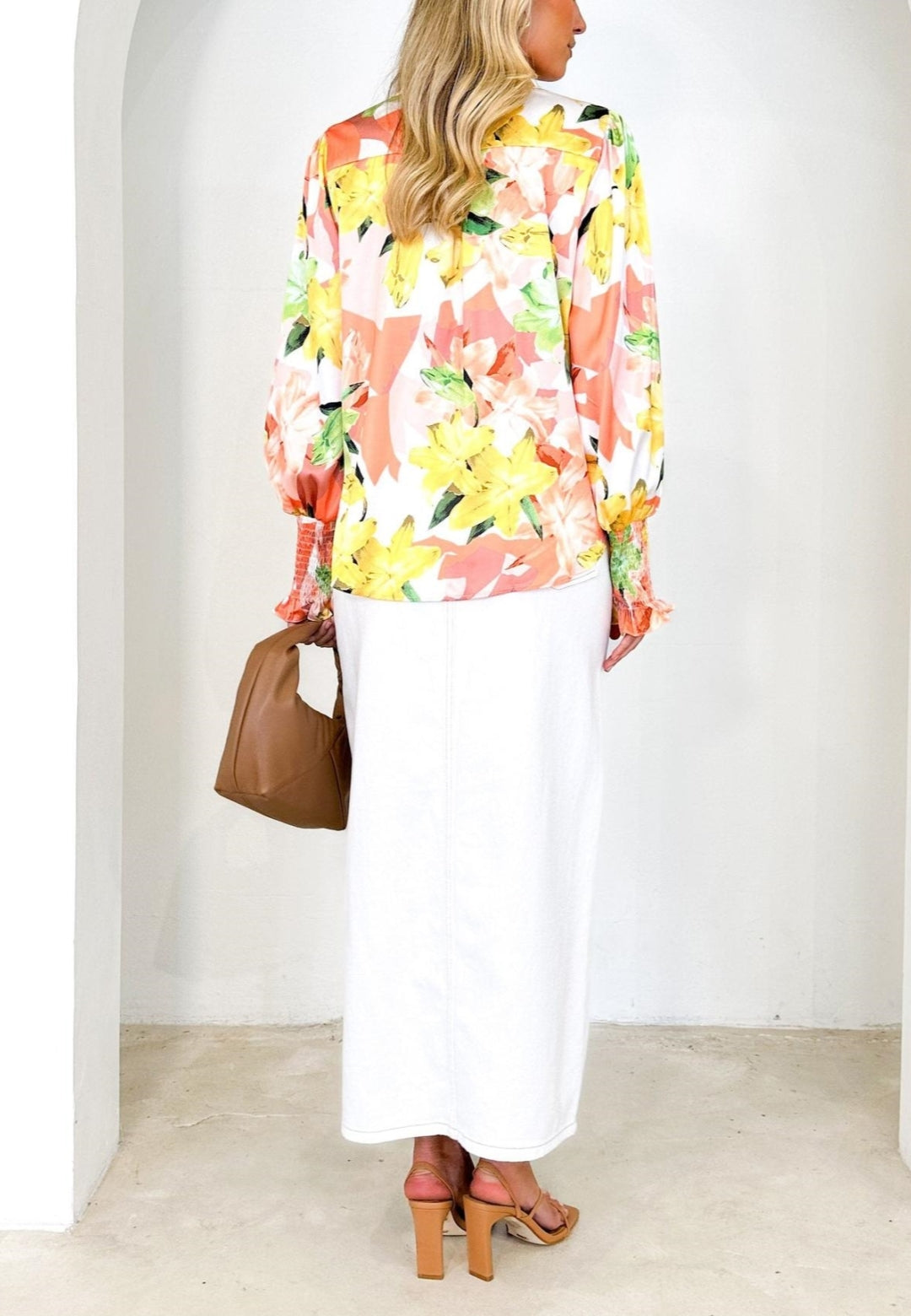 Camisa polo estampada con puños fruncidos