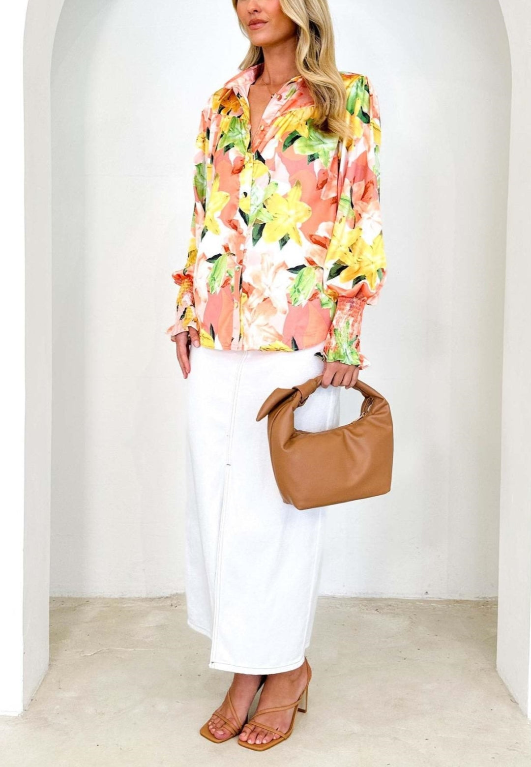 Camisa polo estampada con puños fruncidos