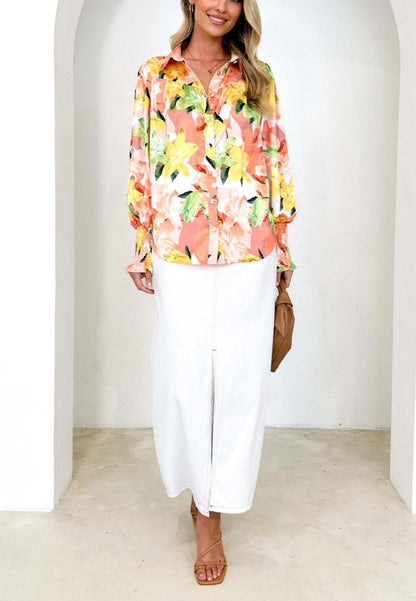 Camisa polo estampada con puños fruncidos