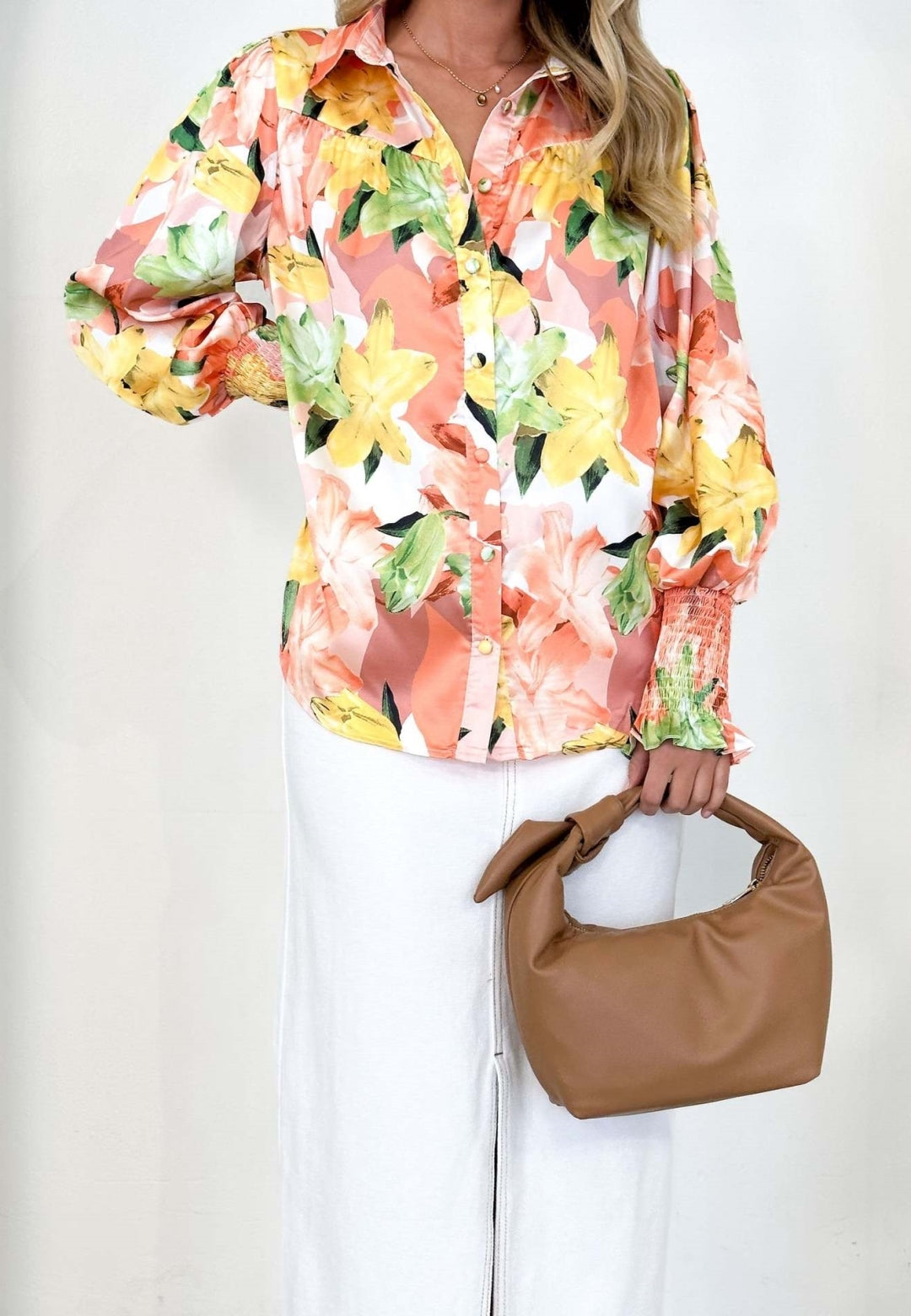 Camisa polo estampada con puños fruncidos