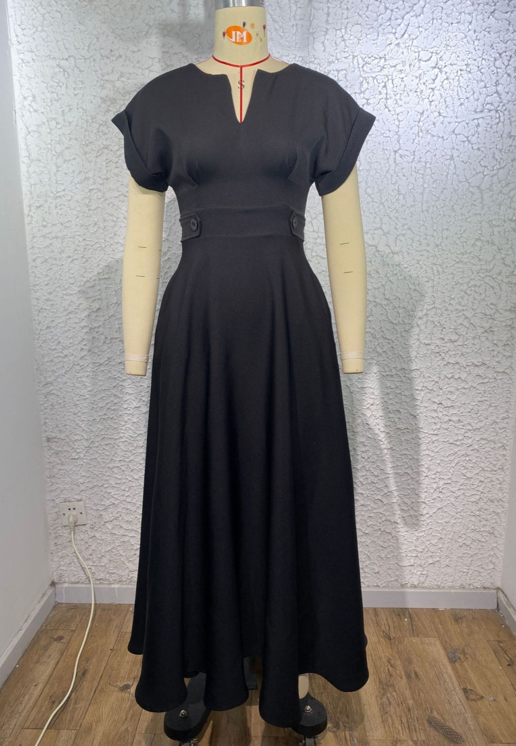 Vestido clásico con botones en la cintura