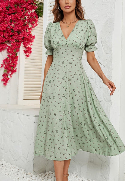 Vestido floral con escote en V y mangas abullonadas