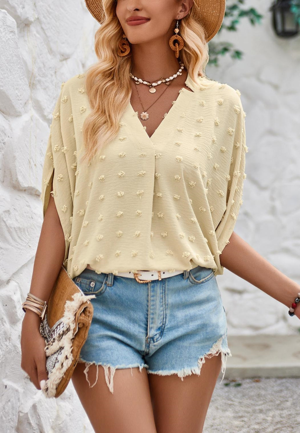 Blusa con mangas de murciélago y lunares suizos