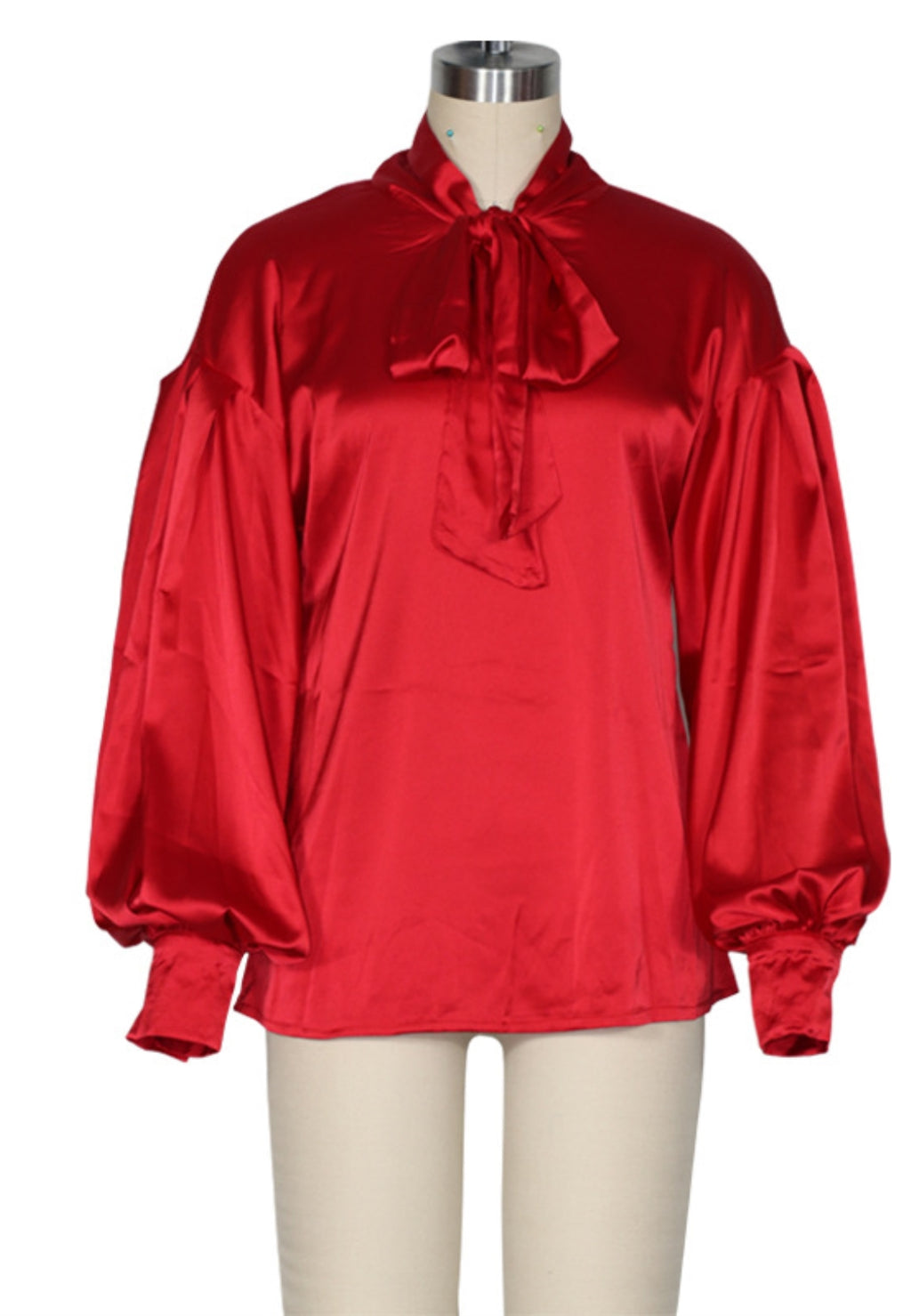 Blusa de satén con lazo en el cuello
