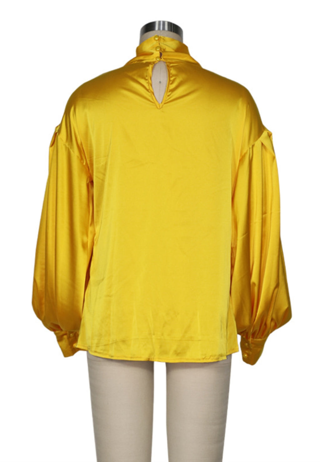 Blusa de satén con lazo en el cuello