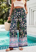 Pantalones bohemios con cintura alta y frunces florales