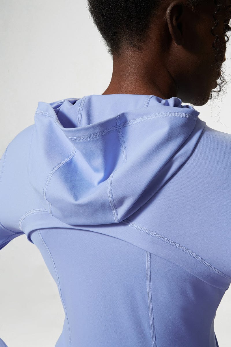 Chaqueta deportiva con capucha y cremallera