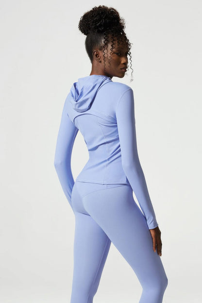 Chaqueta deportiva con capucha y cremallera