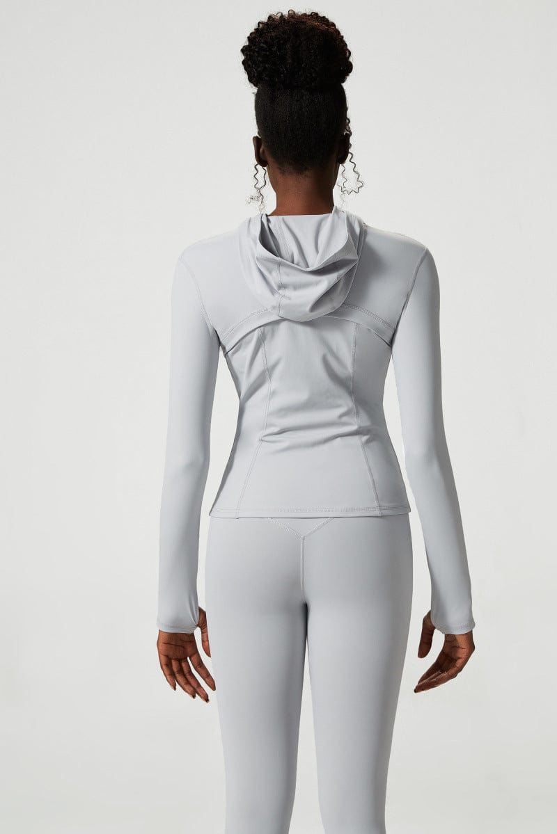 Chaqueta deportiva con capucha y cremallera
