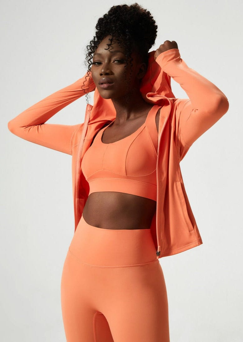 Chaqueta deportiva con capucha y cremallera