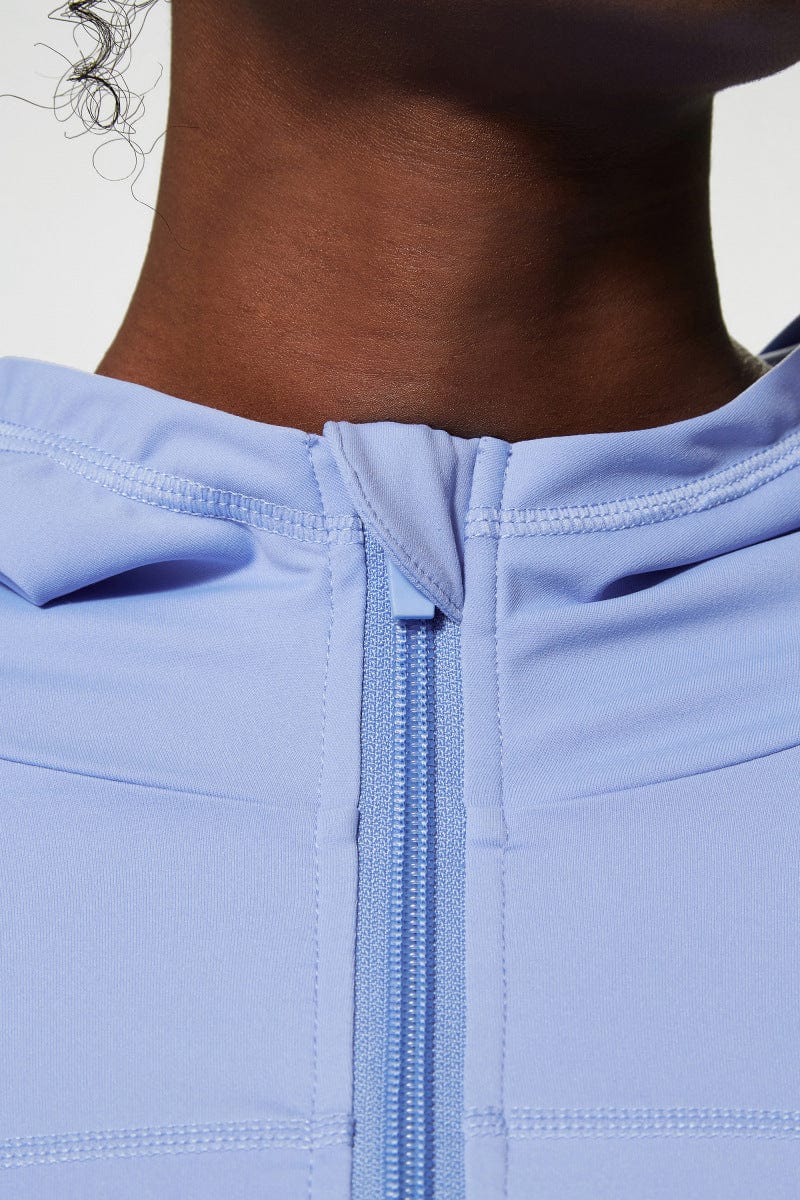 Chaqueta deportiva con capucha y cremallera