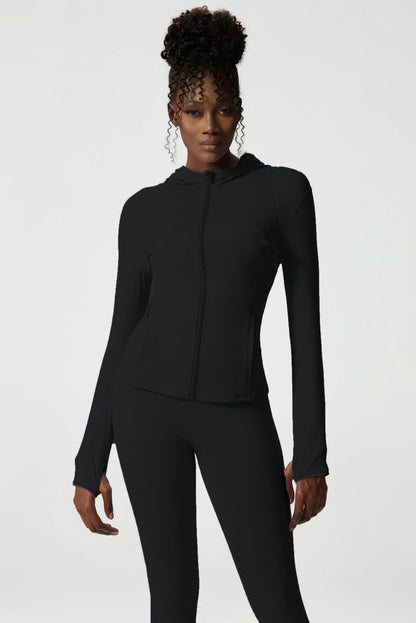 Chaqueta deportiva con capucha y cremallera