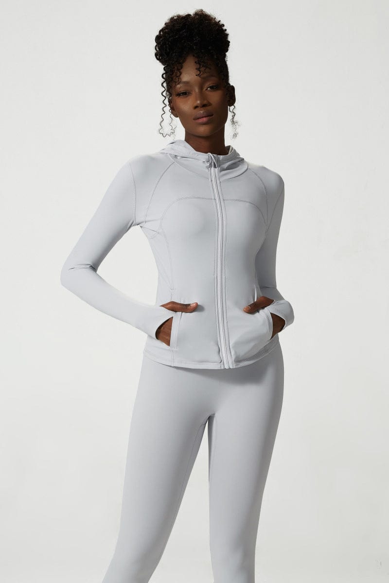 Chaqueta deportiva con capucha y cremallera