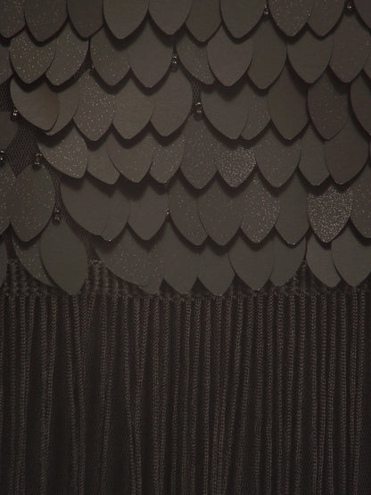 Vestido recto con borlas y flecos de los años 20