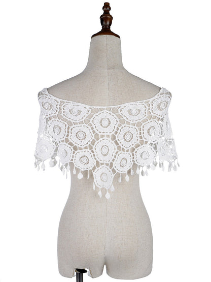 Poncho de red de crochet con borlas de Woodstock