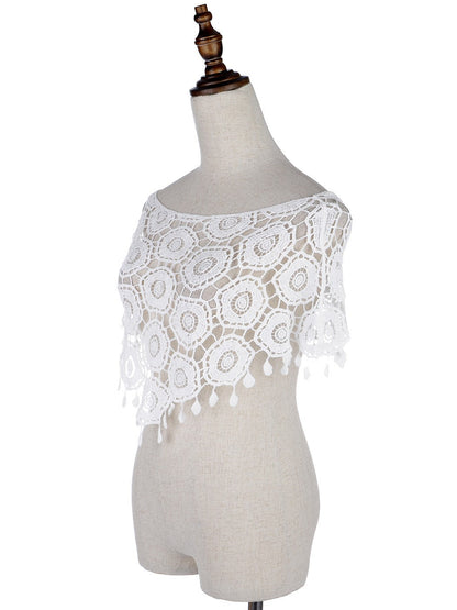Poncho de red de crochet con borlas de Woodstock