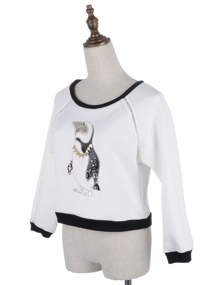 Suéter con estampado de pingüinos adornado con cadena y diamantes de imitación en color blanco talla S/M