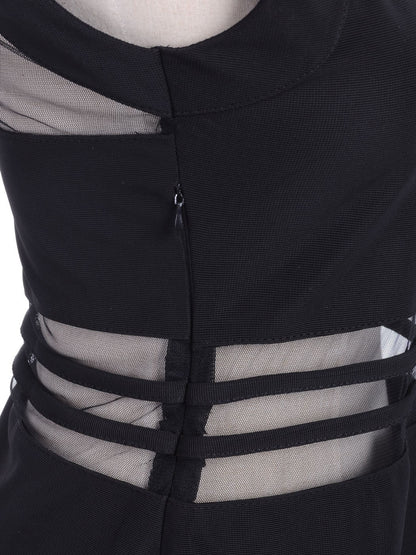 Vestido negro con escote geométrico, mangas cortas y paneles transparentes, talle S/M