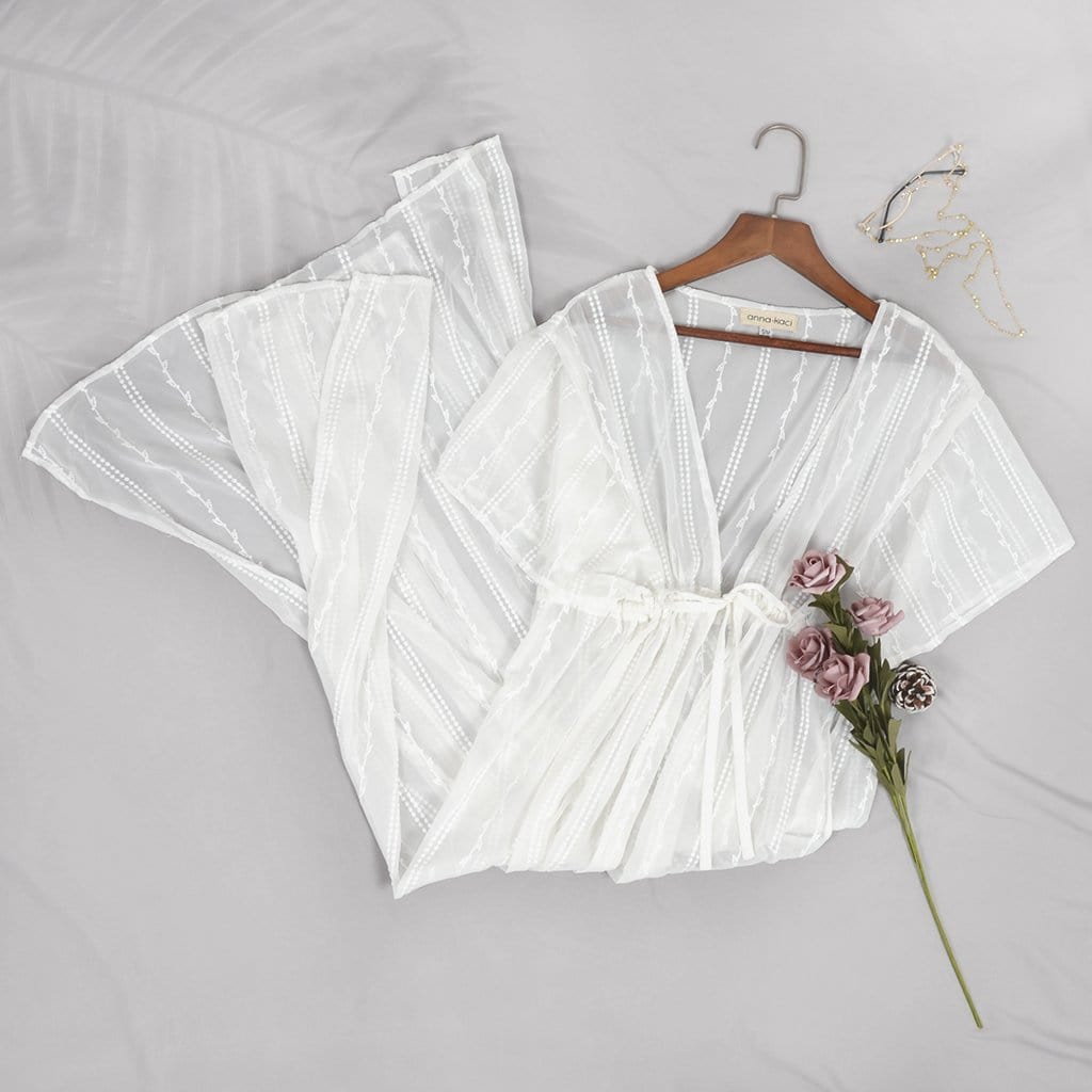 Vestido playero con lazo frontal y aberturas laterales