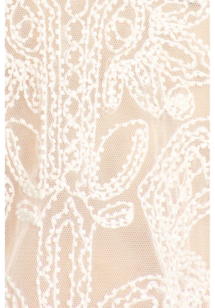 Top de encaje transparente bordado