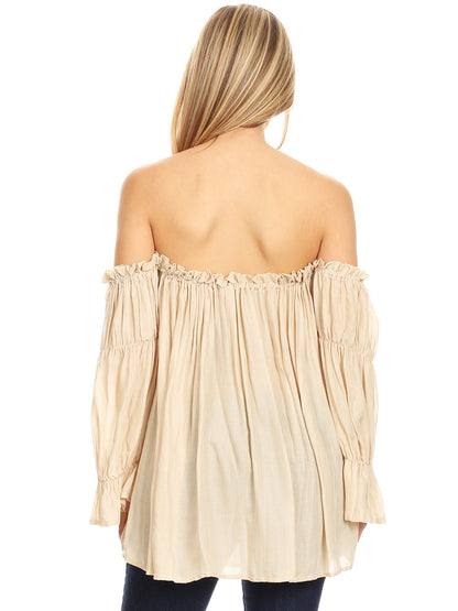 Blusa estilo bohemio semitransparente con hombros descubiertos